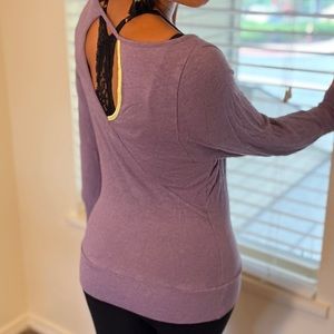 MPG lavender performance sweatshirt.